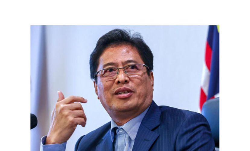 丹斯里阿占巴基。