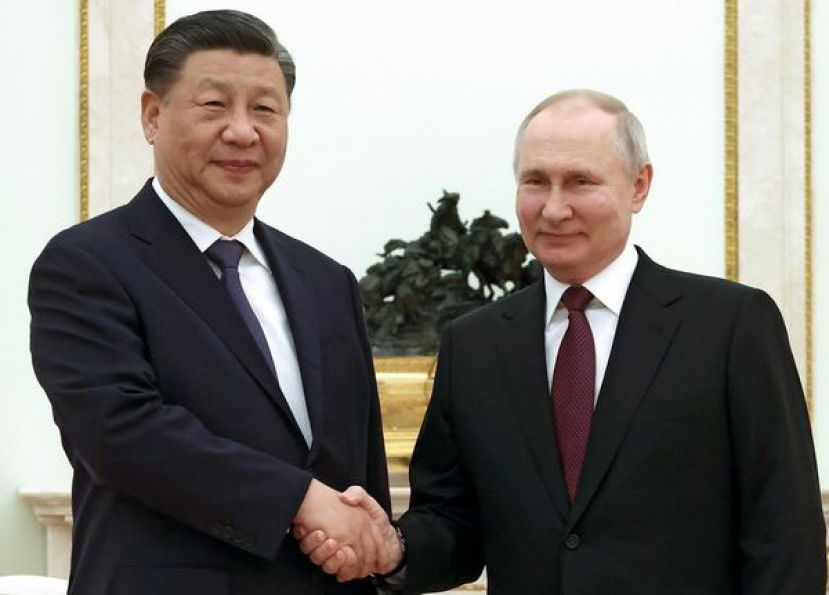 习近平今年3月访问俄罗斯时与普京会面。