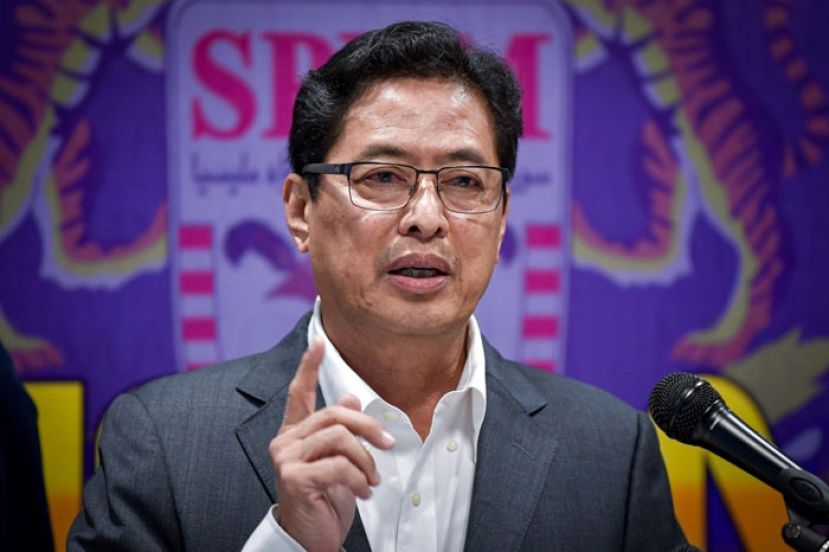 丹斯里阿占巴基。