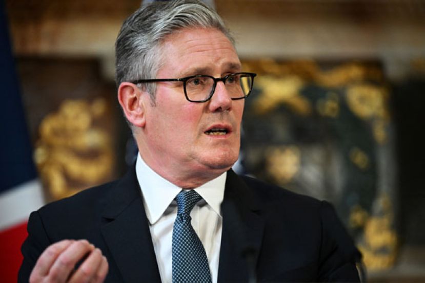 英国首相施凯尔。