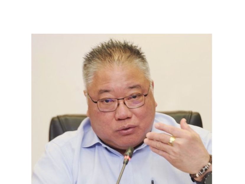 拿督斯里张庆信。